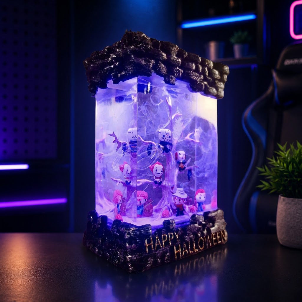 Artisan Halloween resin lamp with haunted tree scene creating spooky ambient room lighting