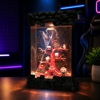 Warm LED Halloween epoxy resin lamp showcasing handcrafted spooky miniature display