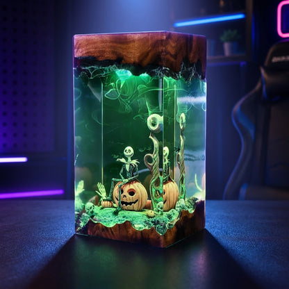 Side angle of a handcrafted skeleton pumpkin king resin lamp with glowing LED lighting